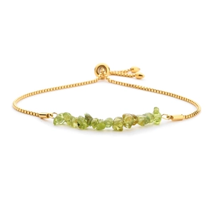Detail view of the adjustable golden box chain with green crystal stone beads