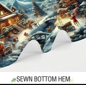 Detail showing the neat sewn bottom hem of a Christmas print shower curtain fabric