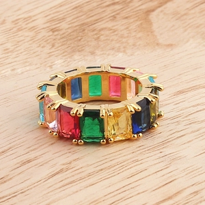 Close-up of rainbow eternity ring with multi-colored rectangular-cut cubic zirconia