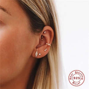 S925 sterling silver curved petal stud earring set with clear zircon stones on ear
