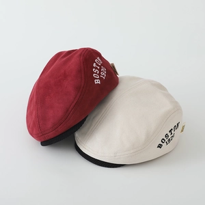 Detail of suede beret hats with Boston 1920 embroidery and corduroy edge for kids
