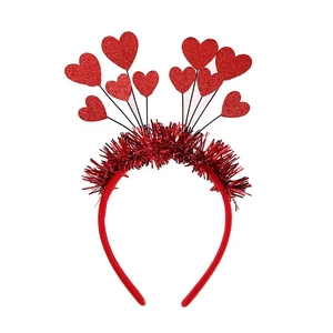 Detail of red sequin heart headband with glitter hearts and shiny tinsel on wire springs