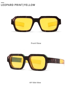 Detail von Retro-Sonnenbrille mit lila Schildpatt-Rahmen und gelben Gläsern im Trend