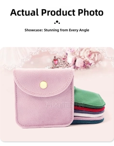 Detailed view of pink velvet jewelry pouch with golden snap button and envelope flap