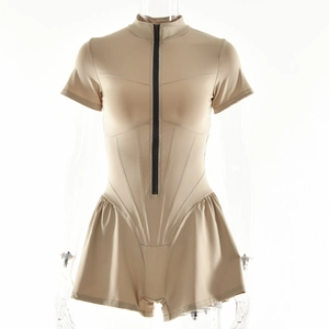 Slim fit beige short sleeve bodysuit with front zipper and ruffled skirt hem