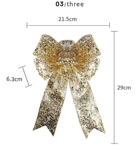 Detail showing 21.5cm width champagne gold sequined bow decoration with size dimensions