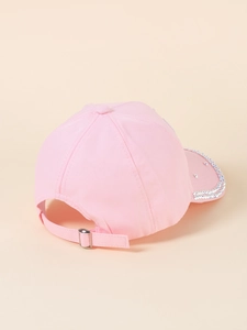 Detailed back view of pink baseball cap featuring silver buckle and rhinestone brim