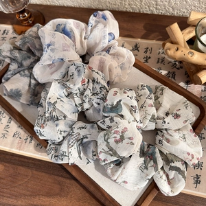 Ink wash calligraphy scrunchies set with traditional Chinese art patterns on wood tray
