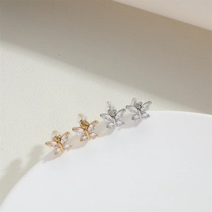 French vintage butterfly stud earrings with sparkling cubic zirconia in gold and silver