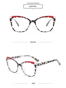 Detailed front and side view of cat-eye tortoiseshell frames with red accent corners