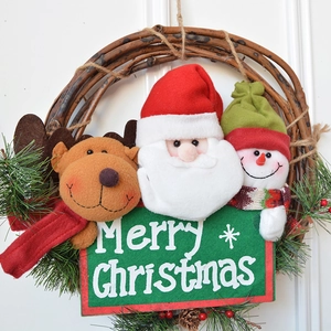 Christmas wreath with Santa Snowman Reindeer plush figures and Merry Christmas sign