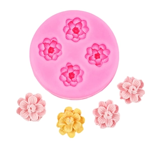 Macro detail of pink silicone flower mold with petal samples for DIY cake decoration