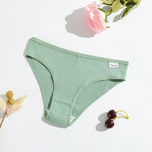 Light green cotton ribbed low-waist briefs for women laid on white with floral accents