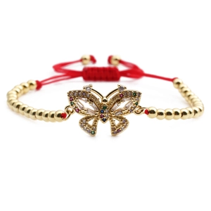 Bracciale intrecciato rosso regolabile con perline dorate e ciondolo a farfalla in zircone