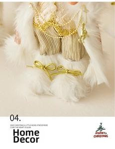 Detailed view of rose gold Santa doll featuring plush textures and glittery bow details