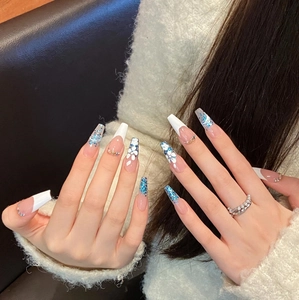 Blue glitter gradient and white floral French tip coffin press-on nails with rhinestones