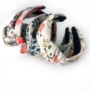 Three cotton linen knotted wide headbands with floral and newspaper prints on white base