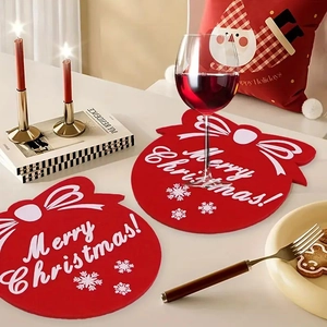 Detailed view of red Christmas felt coaster with white snowflake and Merry Christmas text