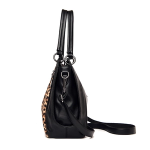 Large leopard print shoulder bag in black leather with silver hardware and side profile