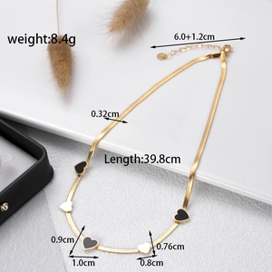 Elegant gold snake chain necklace with black and gold heart pendants for women