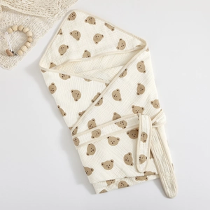 Cotton 4-layer gauze baby hooded swaddle with brown teddy bear pattern on white fabric