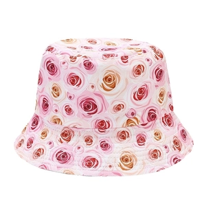 Floral cotton bucket hat with pink rose print for sun protection and outdoor style