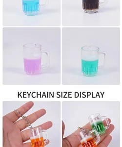 Macro detail of mini beer mug keychain with liquid and handheld scale display