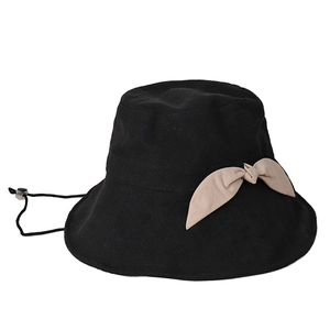 Women's wide brim sun hat in black cotton linen with a beige bow and windproof cord