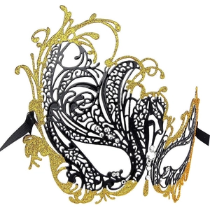 Detail of masquerade half-face mask with gold glitter hollow patterns and rhinestones