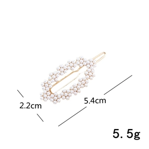Detailed view of heart rhinestone hair clip with dimensions 5.4cm length and 5.5g weight
