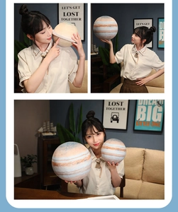 Detailed view of Saturn and Jupiter plush toys with realistic planet textures for kids