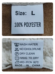 Detailed clothing label showing L size and 100% polyester material on fleece fabric