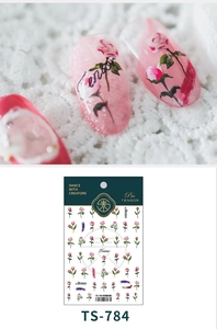 Detailed view of TS-784 pink rose nail stickers on white lace and sample tips