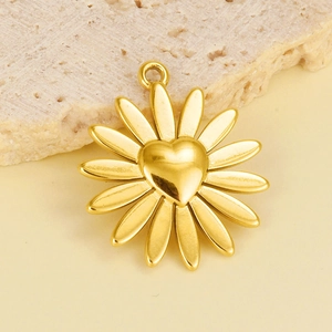 Detailed view of 18k gold plated 304 stainless steel sunflower pendant with heart center