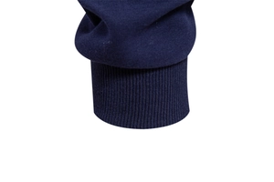 Macro view of dark blue ribbed knitted cuffs on a high-quality long sleeve sweatshirt