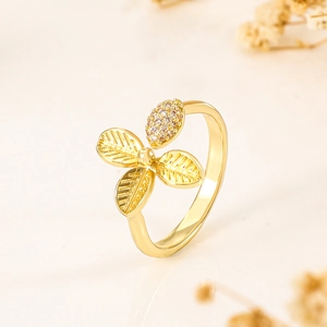 Golden leaf open ring featuring intricate vein texture and sparkling clear zircon accents