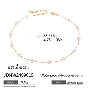 Detail view of a 37.5+5cm gold stainless steel chain necklace with irregular pearls