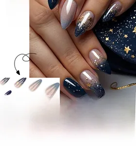 Detail of almond-shaped press-on nails with blue and pink gradient and gold star sequins