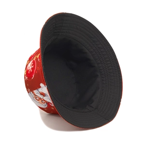 Foldable red Christmas bucket hat with Santa Claus pattern and snow element