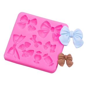 Pink silicone bow mold for DIY fondant cake, chocolate and clay crafts decoration