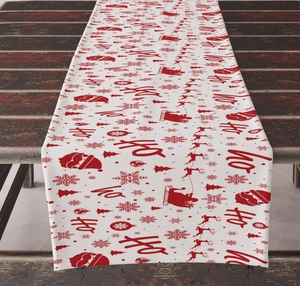 Detailed Christmas table runner with red Santa Claus, reindeer, and snowflakes on white fabric