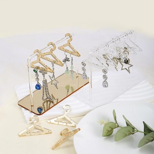 Acrylic clothes hanger style earring display stand in clear and gold mirror finish