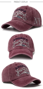 Detail view of burgundy washed cotton baseball cap with vintage New York 1985 embroidery