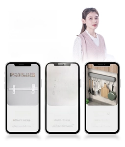 Three-step installation guide for wall-mounted kitchen utensil rack with glue application