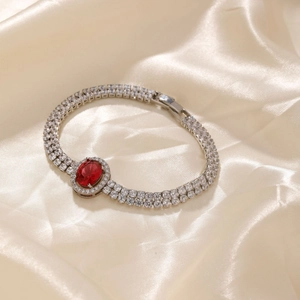 Elegant silver bracelet with large oval red gemstone and double row white zircon pavé