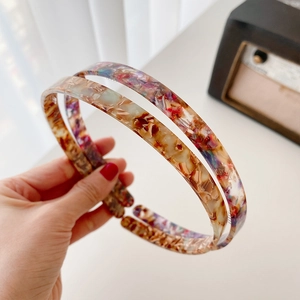 Minimalist tortoiseshell acetate headbands set in vintage brown and cream patterns