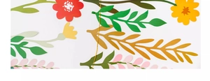 Detailed macro view of colorful die-cut paper flower and leaf garland banner
