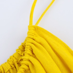 Yellow linen blend sleeveless dress featuring gathered pleated details and thin straps