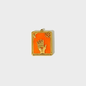 Vintage stainless steel tarot pendant featuring moon and stars with orange enamel inlay