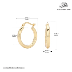 Detailed view of gold twisted hollow hoop earrings with S925 hallmark and size markings